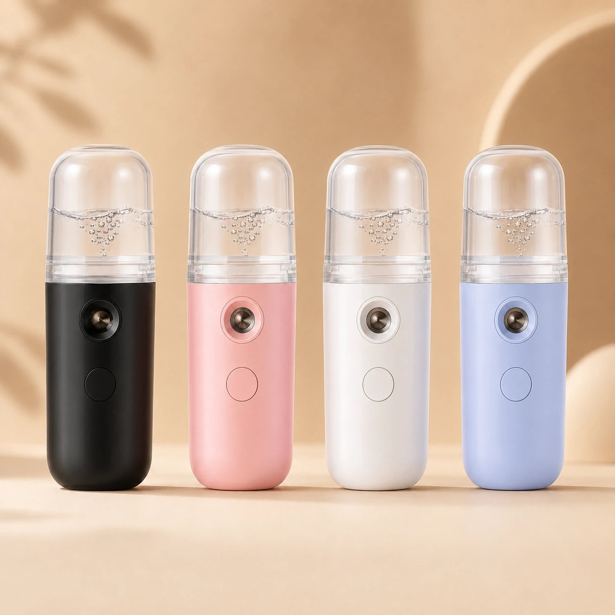 Brumisateur disponible en quatre coloris noir rose blanc et bleu